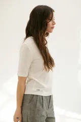 Remera manga 3/4 color celeste.