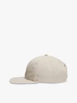 Gorra de béisbol Tommy Jeans confeccionada en tejido ripstop color beige, con visera plana y parche con logo de la marca en la parte frontal.