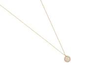 Collar dorado con dije redondo de nácar y circonias.