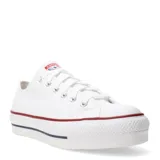 Championes Converse modelo Chuck Taylor All Star Lift, de corte bajo con plataforma doble. Confeccionados en lona de algodón blanca, cuentan con puntera de goma, cordones al tono y detalles de líneas en rojo y azul en la suela.