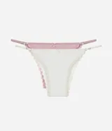 Kit de dos bombachas colaless estilo string, una blanca y otra rosa, confeccionadas en algodón con detalles de encaje en los laterales y un pequeño lazo decorativo en la parte delantera. Cuentan con tiras finas regulables en la cintura.