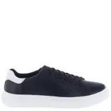 Zapatos urbanos de hombre color negro, con suela blanca y cordones negros.