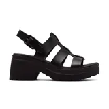 Sandalias de cuero sintético negro con tiras entrecruzadas, hebilla ajustable en el tobillo y plataforma con taco ancho.