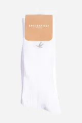 Medias largas blancas con logo bordado.