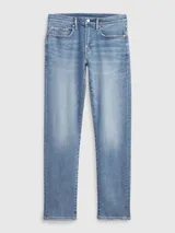 Jean de corte slim en tono azul medio, con diseño de cinco bolsillos, cierre frontal con botón y cremallera, y costuras reforzadas.