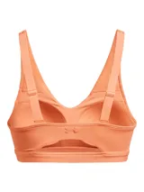 Top deportivo Under Armour modelo SmartForm Evoluti color salmón, con escote en V y diseño de tirantes cruzados en la espalda.