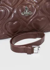 Cartera hobo negra de cuero sintético acolchado con diseño de corazones y logo plateado de Vivienne Westwood al frente.