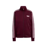 Campera deportiva adidas modelo Firebird, color bordó con las icónicas tres tiras blancas en las mangas y logo del trébol bordado en el pecho. Cuenta con cuello alto, cierre frontal completo y puños acanalados.