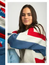 Buzo de algodón de corte premium con diseño de bloques de color en las mangas, cuello redondo y logo bordado en el pecho. Presenta costuras reforzadas y mangas anchas.