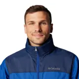 Campera impermeable Columbia Glennaker Lake Jkt con tecnología Omni-Shield, diseño bicolor en tonos azul y azul marino, con capucha plegable y cierre frontal.