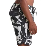 Boardshort de baño Volcom con estampado floral en blanco y negro, confeccionado en tejido técnico con cintura elástica y cordón de ajuste.