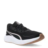 Championes de running Puma Skyrocket Lite 2 para mujer, con capellada de malla textil transpirable en color negro, entresuela blanca con tecnología PUMALITE y suela de goma color marrón. Presenta detalles en tono cobre y logo de la marca en la lengüeta.