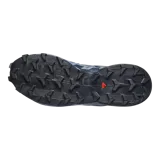 Calzado de trekking Salomon modelo Speedcross 6, en tonos gris y verde claro, diseñadas para trail running con suela de gran tracción y cordones de ajuste rápido.