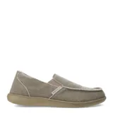 Zapatos tipo slip-on de tela color beige, con diseño de bordes deshilachados y suela de goma al tono.