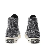 Championes Converse Chuck 70 Hi, unisex, color negro con textura brillante y detalles plateados.