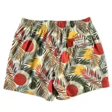 Short de baño Von Braun con estampado tropical de hojas y círculos en tonos rojos, amarillos y verdes sobre fondo claro. Cuenta con cintura elástica, dos bolsillos laterales, un bolsillo trasero con cierre y etiqueta de la marca.