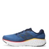 Championes New Balance Running eVOZ, color azul con detalles en rojo, amarillo y negro.