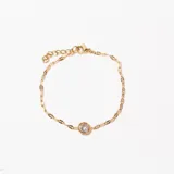 Pulsera dorada con cadena de eslabones y dije de cristal engarzado.
