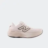 Championes de running New Balance Fresh Foam X 880, color rosado con logo N en marrón y suela de goma.