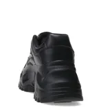 Championes blancos con plataforma alta y suela con diseño irregular.