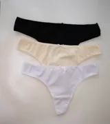 Pack de tres colaless de algodón elastizado con tiro alto y moño decorativo.