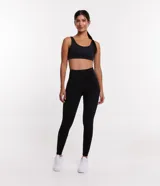 Pantalón legging deportivo de tiro alto, confeccionado en poliamida y elastano, con diseño ajustado y costuras reforzadas.