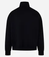 Buzo negro de algodón con felpa, corte boxy, cuello alto con cremallera, mangas largas con puños ajustados y bordado con la frase "Join the hype".