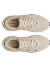 Championes de running Under Armour modelo Rogue 6, color beige, con capellada de malla transpirable y entresuela Charged+ para mayor amortiguación y respuesta.