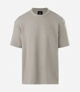 Remera masculina de algodón y poliéster, color verde claro, con cuello redondo, manga corta y corte relajado. Presenta una textura de mini waffle.
