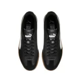 Championes Puma 9T blancos con detalles en verde y beige, suela color caramelo.