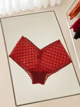Bombacha tipo pantie de tiro alto confeccionada en encaje rojo con diseño geométrico a cuadros y bordes scalloped.