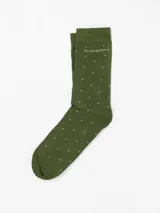 Medias de vestir verde oliva con lunares pequeños color crema y logo de la marca en el puño.