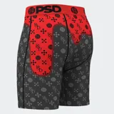 Calzoncillos bóxer estampados con diseño de boca de tiburón y logo de la marca en la cintura.