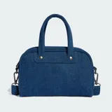 Minibolsa tipo bowling de Adidas Originals confeccionada en denim azul, con asas superiores, correa de hombro desmontable, cierre de cremallera y detalle del logo Trefoil metálico en el frente.