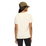 Remera de corte holgado color crema, con cuello redondo, mangas cortas y un bolsillo frontal en el lado izquierdo que presenta el logo de la marca estampado.