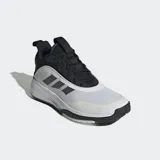 Championes de básquet Adidas Own The Game 3, color blanco con detalles en negro y las tres tiras características de la marca en negro.
