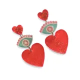 Aros colgantes con forma de corazón y ojo turco, con glitter.