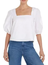 Blusa blanca con escote cuadrado, mangas abullonadas 3/4 y lazo en la espalda.