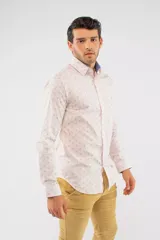 Camisa de manga larga Brooksfield con corte slim, color azul marino y estampado de pequeñas hojas y puntos. Presenta cierre frontal con botones y logo bordado en el pecho.