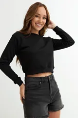 Sweatshirt gris claro de algodón, de corte clásico y manga larga.