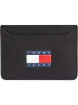 Tarjetero negro de cuero, poliéster y poliuretano, con logo de Tommy Jeans engomado en la parte delantera y múltiples ranuras exteriores para tarjetas.
