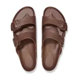Sandalia Birkenstock modelo Arizona, confeccionada en material EVA ligero y resistente al agua. Presenta diseño de dos correas con hebillas ajustables y plantilla anatómica.