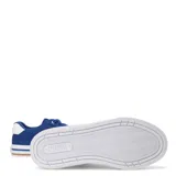 Championes urbanos Puma modelo Court Classic Vulc, color negro con detalles en blanco. Presentan un diseño de corte bajo con capellada de lona, cierre de cordones y suela vulcanizada con franja decorativa.