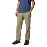 Pantalón de senderismo convertible en short, color beige, con múltiples bolsillos cargo y cierre de cremallera en las rodillas. Cuenta con tecnología de protección solar y tejido de secado rápido.