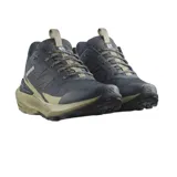 Championes de trail running Salomon modelo Elixir Activ, con diseño técnico en combinación de colores azul marino y beige. Presentan suela con tecnología Contagrip para mayor tracción y chasis activo para estabilidad.