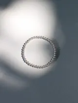 Pulsera elástica de cuentas de 4mm en oro laminado 14 kilates.