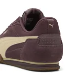 Championes Puma modelo Bella Donna SD, color uva con detalles en crema y suela de goma.