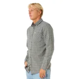 Camisa de manga larga con estampado a cuadros en tonos gris, azul y marrón. Tiene cuello clásico, bolsillo en el pecho y cierre con botones.