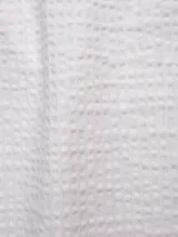 Pantalón azul marino de algodón con textura, cintura elastizada con cordón, bolsillos laterales y trasero.