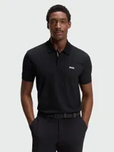Cinturón trenzado elástico Boss modelo Vern, en color negro con detalles de hebilla metálica.
